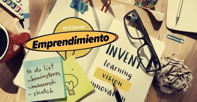 Imagen de escritorio creativo con mensaje “Feliz Día del Emprendimiento” y logo de La EJE